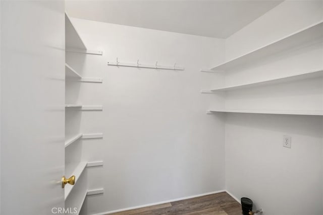 101 Briarwood Unit 3, Irvine, CA 92604 - washroom featuring wood finished floors and baseboards