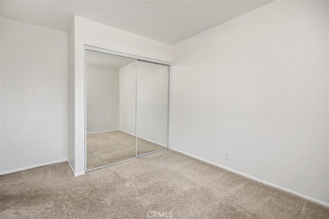101 Briarwood Unit 3, Irvine, CA 92604 - unfurnished bedroom with carpet flooring and a closet
