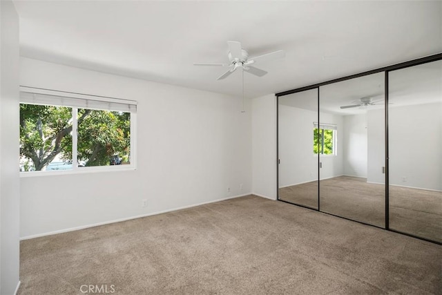 101 Briarwood Unit 3, Irvine, CA 92604 - unfurnished bedroom featuring carpet floors, a closet, and ceiling fan