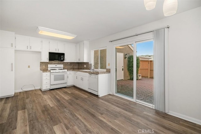 101 Briarwood Unit 3, Irvine, CA 92604 - kitchen with white appliances, dark wood-style floors, backsplash, and white cabinets