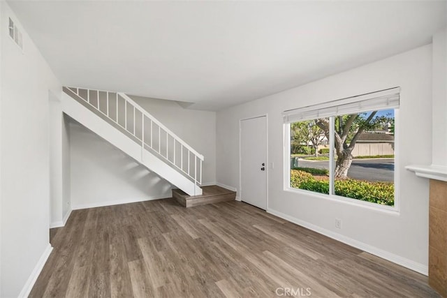 101 Briarwood Unit 3, Irvine, CA 92604 - foyer entrance featuring wood finished floors and stairway