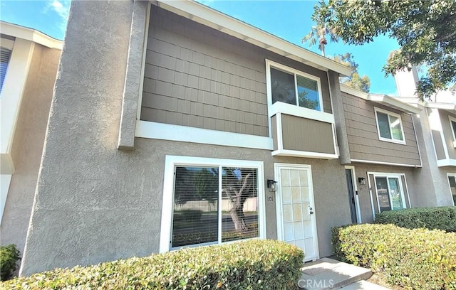 101 Briarwood Unit 3, Irvine, CA 92604 - view of side of property with stucco siding