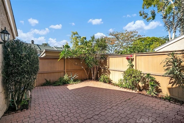 101 Briarwood Unit 3, Irvine, CA 92604 - fenced backyard with a patio area