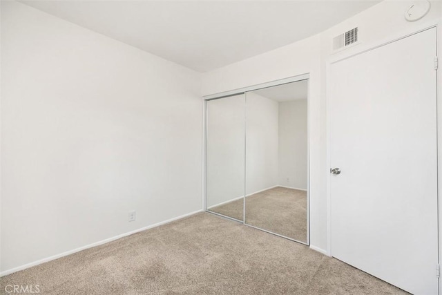 101 Briarwood Unit 3, Irvine, CA 92604 - unfurnished bedroom featuring carpet and a closet