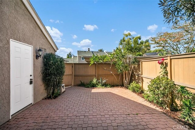 101 Briarwood Unit 3, Irvine, CA 92604 - fenced backyard featuring a patio area