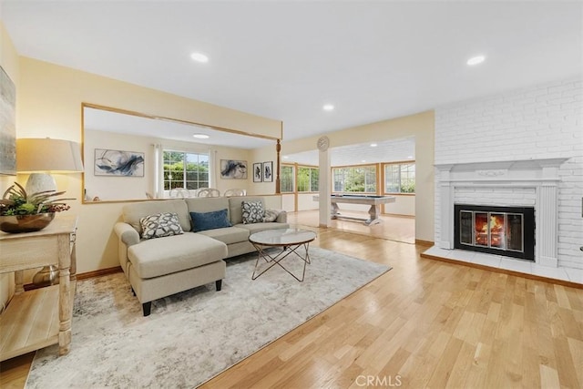 19347 Andrada Dr, Rowland Heights, CA 91748 - living area with wood finished floors, recessed lighting, a fireplace, and baseboards