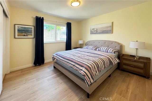 19347 Andrada Dr, Rowland Heights, CA 91748 - bedroom featuring light wood-type flooring, baseboards, and a closet