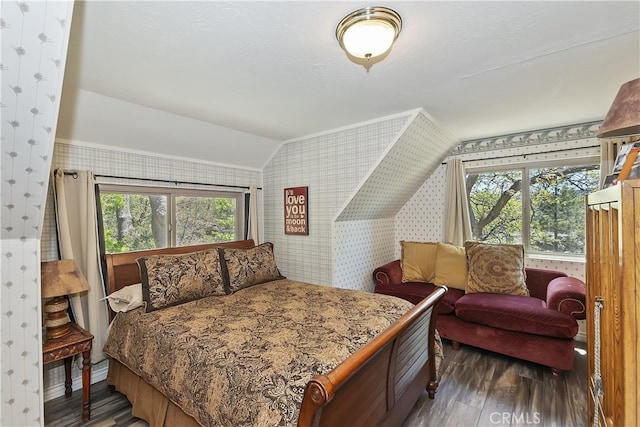 1249 Yellowstone Dr, Lake Arrowhead, CA 92352 - bedroom with wallpapered walls, wood finished floors, and vaulted ceiling