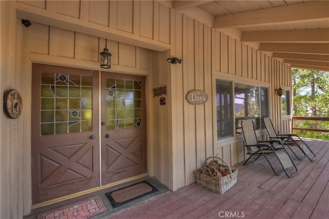 1249 Yellowstone Dr, Lake Arrowhead, CA 92352 - doorway to property featuring a porch and board and batten siding