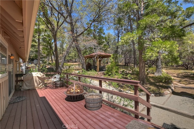 1249 Yellowstone Dr, Lake Arrowhead, CA 92352 - wooden deck with a gazebo, grilling area, and view of scattered trees