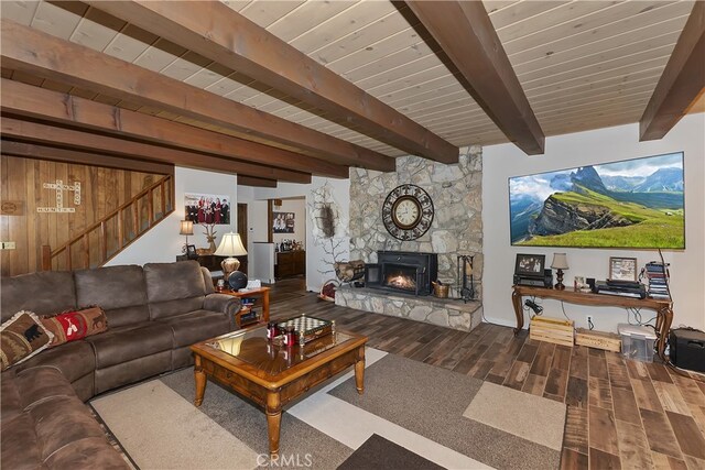 1249 Yellowstone Dr, Lake Arrowhead, CA 92352 - living area with wood finished floors, beamed ceiling, stairway, a stone fireplace, and wood ceiling