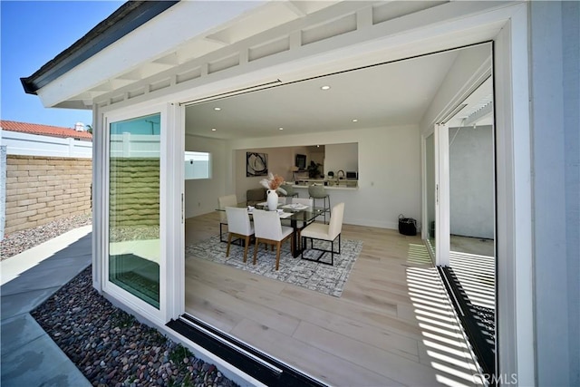 21651 Hilaria, Huntington Beach, CA 92646 - wooden deck featuring fence and outdoor dining area