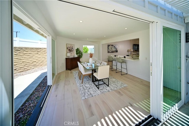 21651 Hilaria, Huntington Beach, CA 92646 - dining room with light wood-type flooring, baseboards, and recessed lighting