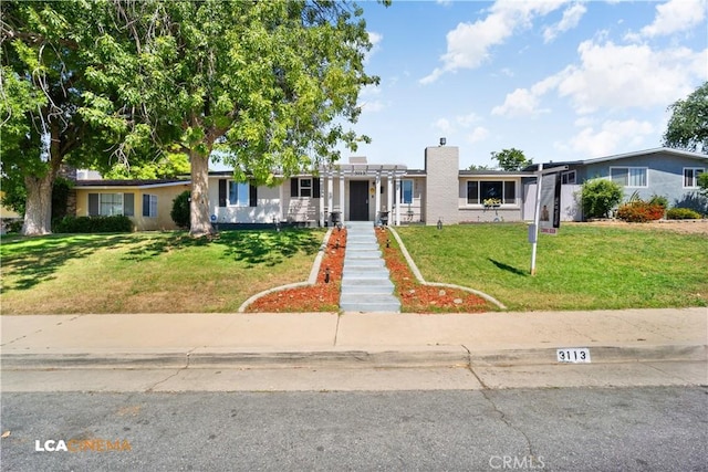 3113 Occidental St, Bakersfield, CA 93305 - ranch-style home with a front yard and a chimney