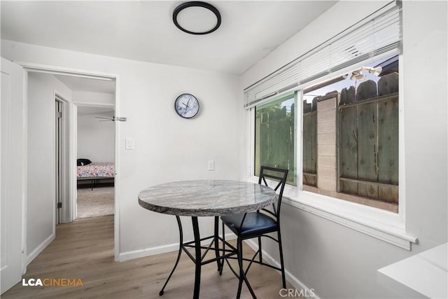 3113 Occidental St, Bakersfield, CA 93305 - dining area featuring baseboards and wood finished floors