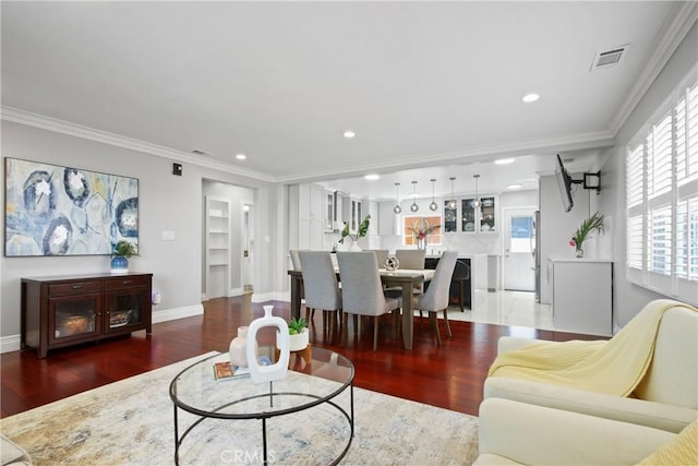 3950 E De Ora Way, Long Beach, CA 90815 - living area with wood finished floors, ornamental molding, recessed lighting, and baseboards