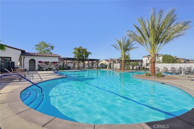 80218 Whisper Rock Way, La Quinta, CA 92253 - community pool with a patio area and fence