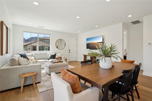 80218 Whisper Rock Way, La Quinta, CA 92253 - dining room with recessed lighting and light wood-style flooring