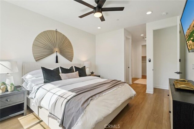 80218 Whisper Rock Way, La Quinta, CA 92253 - bedroom featuring recessed lighting, light wood-style floors, and a ceiling fan
