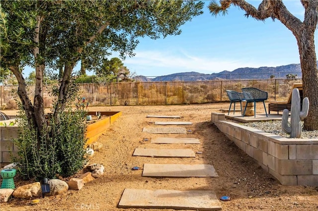 61475 Alta Vista Dr, Joshua Tree, CA 92252 - view of yard featuring fence and a mountain view