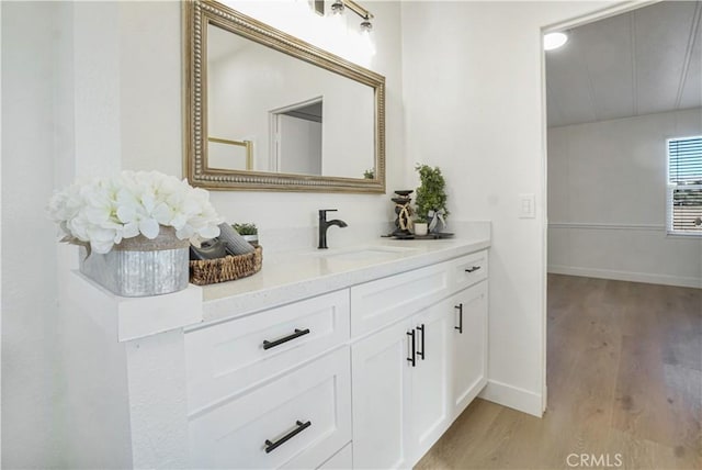 6294 Sunnyslope Rd, Phelan, CA 92371 - bathroom with wood finished floors, baseboards, and vanity