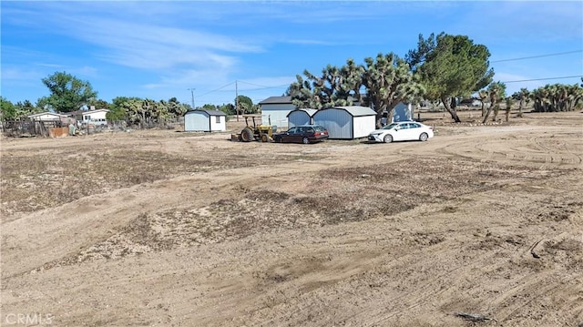 6294 Sunnyslope Rd, Phelan, CA 92371 - view of car parking with a shed