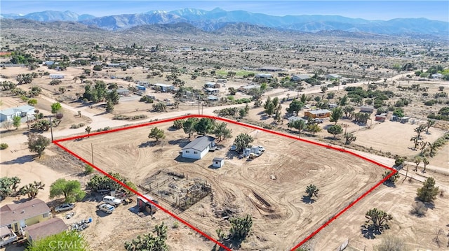 6294 Sunnyslope Rd, Phelan, CA 92371 - aerial view of sparsely populated area with property parcel outlined, mountains, and a desert landscape