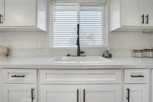 6294 Sunnyslope Rd, Phelan, CA 92371 - kitchen featuring white cabinetry and a sink