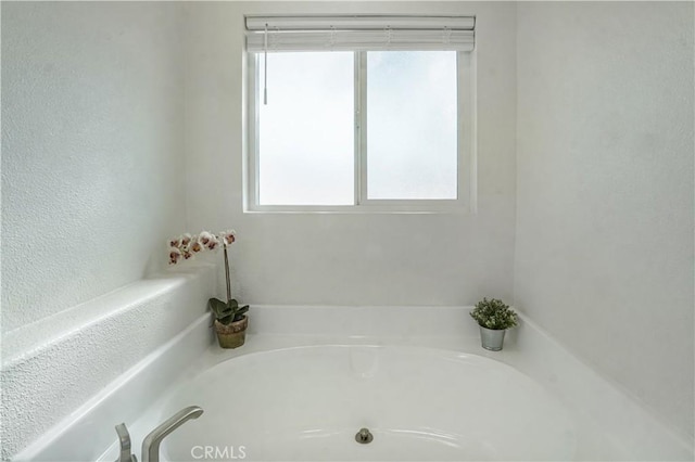 6294 Sunnyslope Rd, Phelan, CA 92371 - bathroom with a bath and healthy amount of natural light