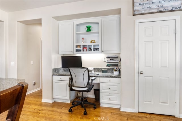 27335 Wedgewood Way, Murrieta, CA 92562 - office featuring built in study area, light wood-type flooring, and baseboards