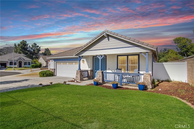 27335 Wedgewood Way, Murrieta, CA 92562 - view of front of home featuring covered porch, concrete driveway, an attached garage, stucco siding, and stone siding