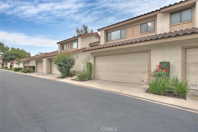 23020 Paseo De Terrado Unit 2, Diamond Bar, CA 91765 - view of front of home with stucco siding and a tile roof