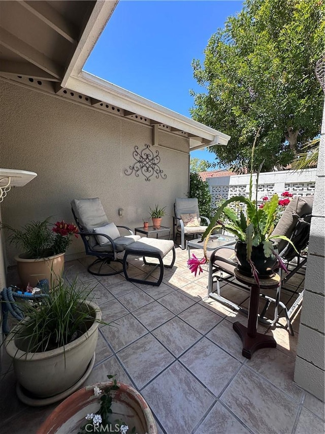 253 Calle Aragon Unit F, Laguna Woods, CA 92637 - view of patio / terrace featuring fence