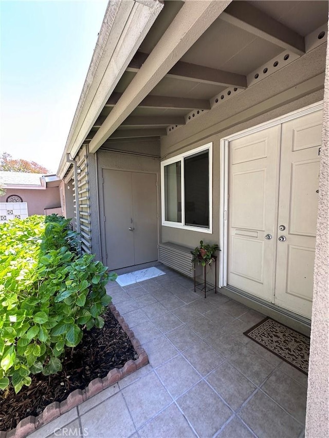 253 Calle Aragon Unit F, Laguna Woods, CA 92637 - entrance to property featuring a patio