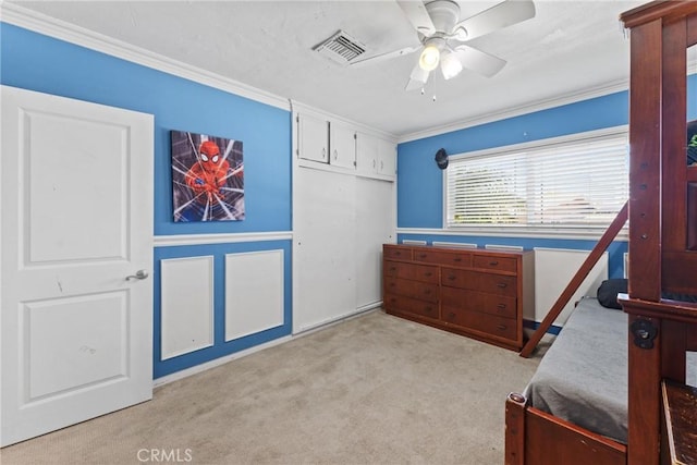 281 Harruby Dr, Calimesa, CA 92320 - carpeted bedroom featuring crown molding, ceiling fan, and a closet