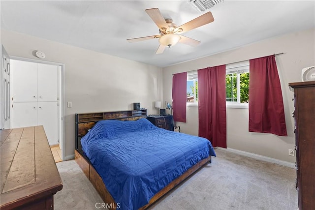 281 Harruby Dr, Calimesa, CA 92320 - bedroom with light carpet, baseboards, and a ceiling fan
