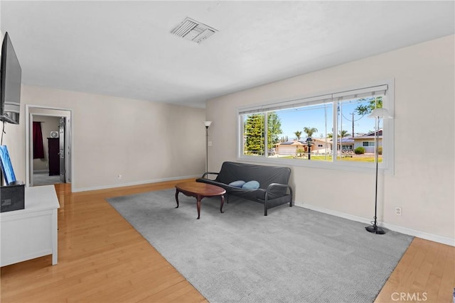 281 Harruby Dr, Calimesa, CA 92320 - sitting room with wood finished floors and baseboards