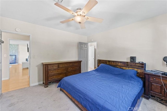 281 Harruby Dr, Calimesa, CA 92320 - bedroom featuring light carpet, a ceiling fan, and baseboards