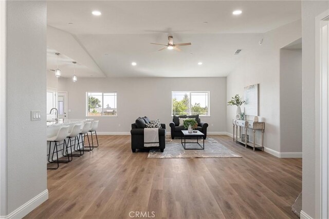 5122 Feather Rock Ct, Paradise, CA 95969 - living area featuring ceiling fan, light wood finished floors, baseboards, recessed lighting, and lofted ceiling