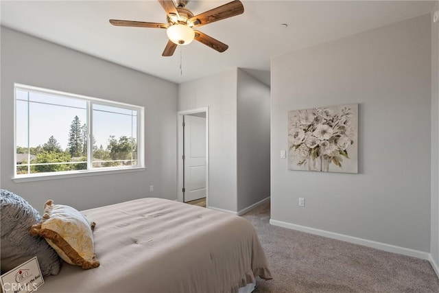 5122 Feather Rock Ct, Paradise, CA 95969 - carpeted bedroom with baseboards and a ceiling fan