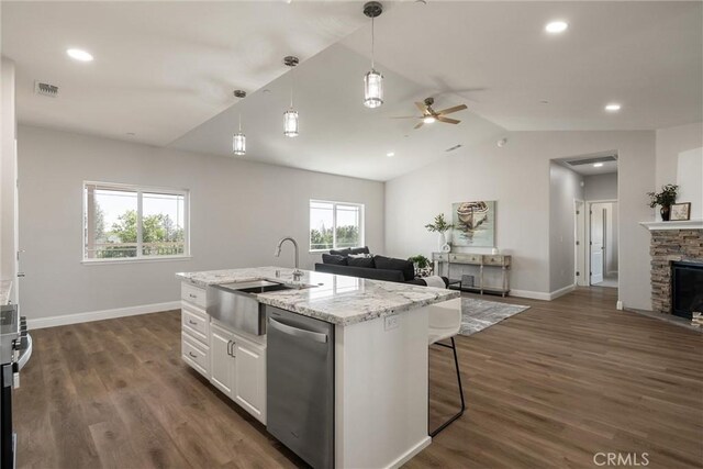 5122 Feather Rock Ct, Paradise, CA 95969 - kitchen featuring stainless steel dishwasher, open floor plan, a sink, a ceiling fan, and vaulted ceiling