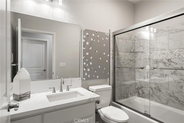 5122 Feather Rock Ct, Paradise, CA 95969 - full bath featuring shower / bath combination with glass door, vanity, and toilet