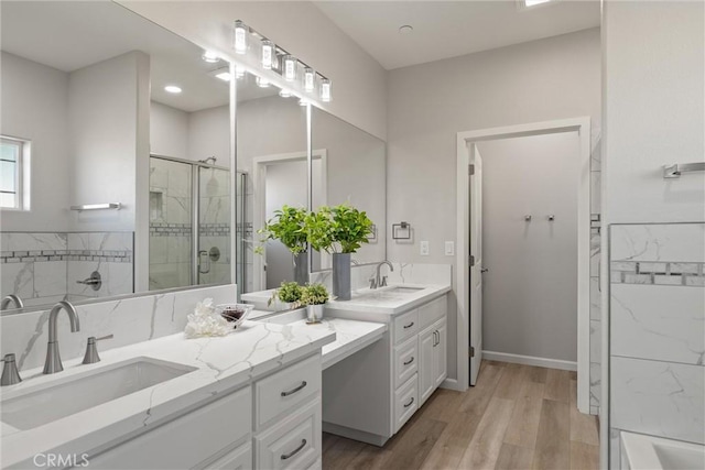 5122 Feather Rock Ct, Paradise, CA 95969 - full bathroom featuring a tile shower, vanity, wood finished floors, and a tub to relax in