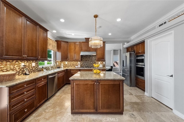 40493 Calle Katerine, Temecula, CA 92591 - kitchen featuring stainless steel appliances, under cabinet range hood, a sink, a center island, and crown molding