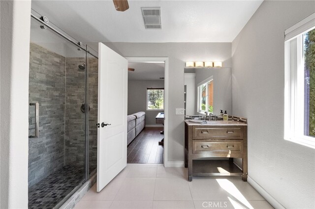40493 Calle Katerine, Temecula, CA 92591 - full bathroom featuring a stall shower, ensuite bathroom, vanity, and tile patterned floors