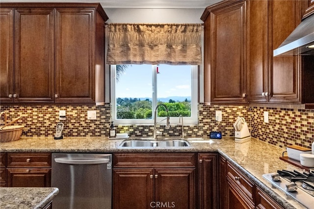 40493 Calle Katerine, Temecula, CA 92591 - kitchen with stainless steel appliances, a sink, under cabinet range hood, and backsplash