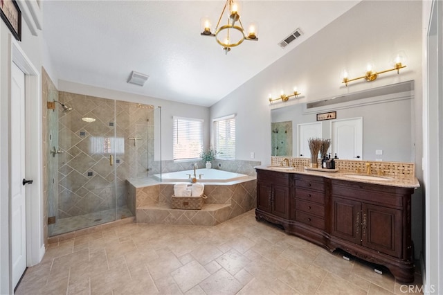 40493 Calle Katerine, Temecula, CA 92591 - full bathroom featuring a garden tub, lofted ceiling, a shower stall, double vanity, and a chandelier
