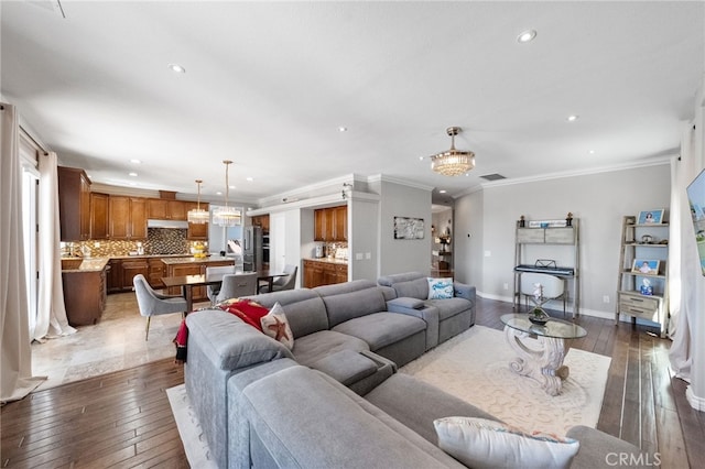40493 Calle Katerine, Temecula, CA 92591 - living room featuring hardwood / wood-style floors, crown molding, recessed lighting, and baseboards