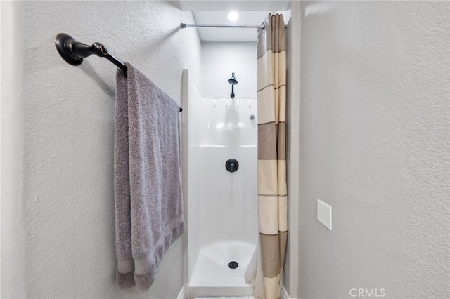 40493 Calle Katerine, Temecula, CA 92591 - bathroom with a textured wall and a shower stall