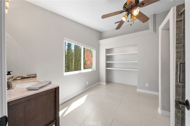 40493 Calle Katerine, Temecula, CA 92591 - unfurnished bedroom featuring a sink, baseboards, light tile patterned flooring, and ceiling fan